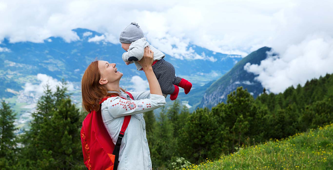 A mother plays with her baby knowing her loved one is financially protected under Life Insurance in the unfortunate event of death.